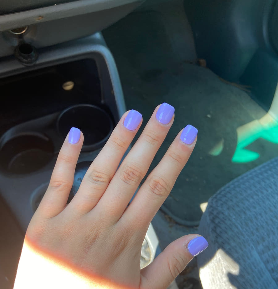 Squared nails painted periwinkle blue